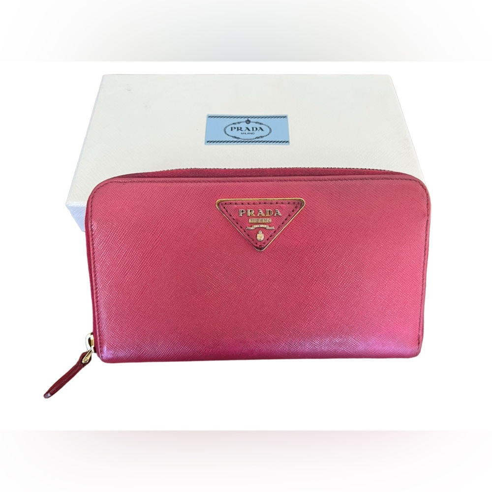 Prada Hot Pink Saffiano zippy long wallet.
